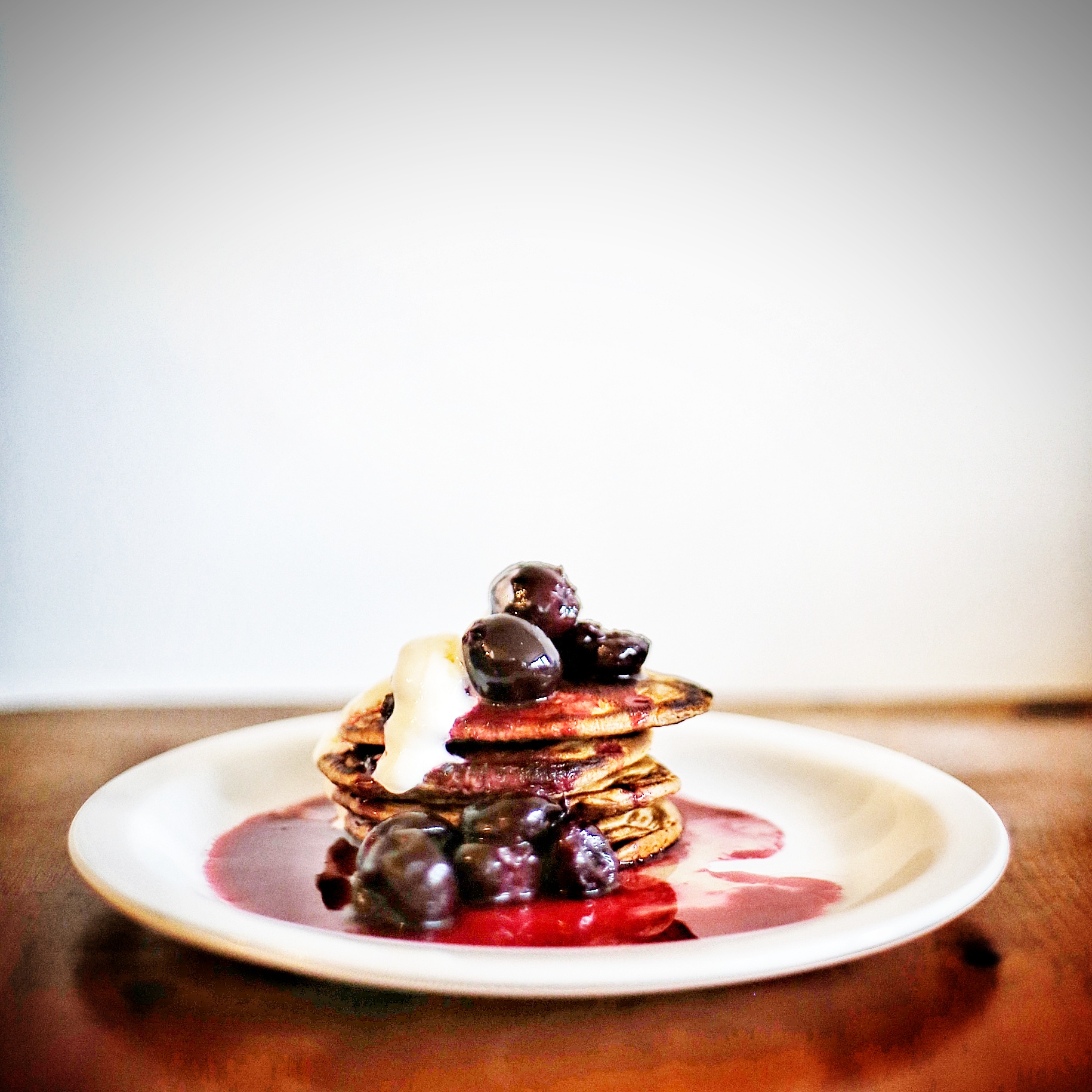 Pancakes with cherry compote and yoghurt