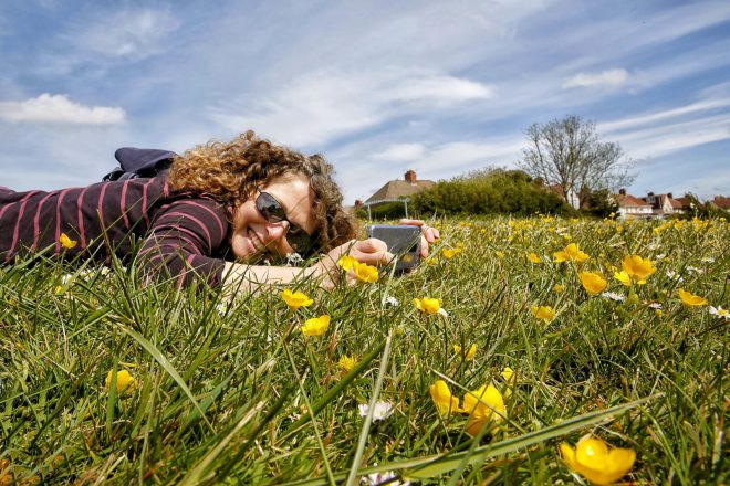 Sarah in field of buttercups