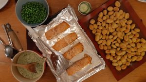 Baked salmon and gnocchi with creamy spinach sauce