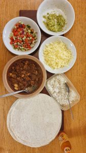 Mushroom and black bean chilli burritos