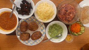 Chipotle spiced beans with jackets and slaw