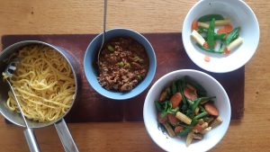 Chilli bean pork with noodles and stir fry veg