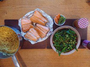 Salmon and noodles with chilli peanut dressing