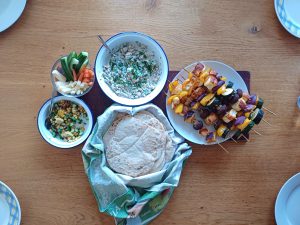 Veg and halloumi kebabs with Mexican corn salad