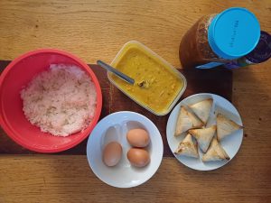 Dahl with egg and samosas