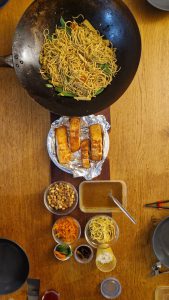 Salmon with veg noodles and peanut curry sauce