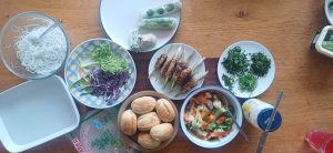 Summer rolls and lemongrass pork kebabs