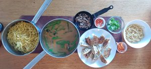 Harvey spicy peanut pork noodle soup with dumplings