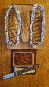 Lentil and quinoa ragu with garlic baguette