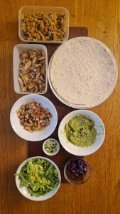 Baked chicken and black bean rice burritos